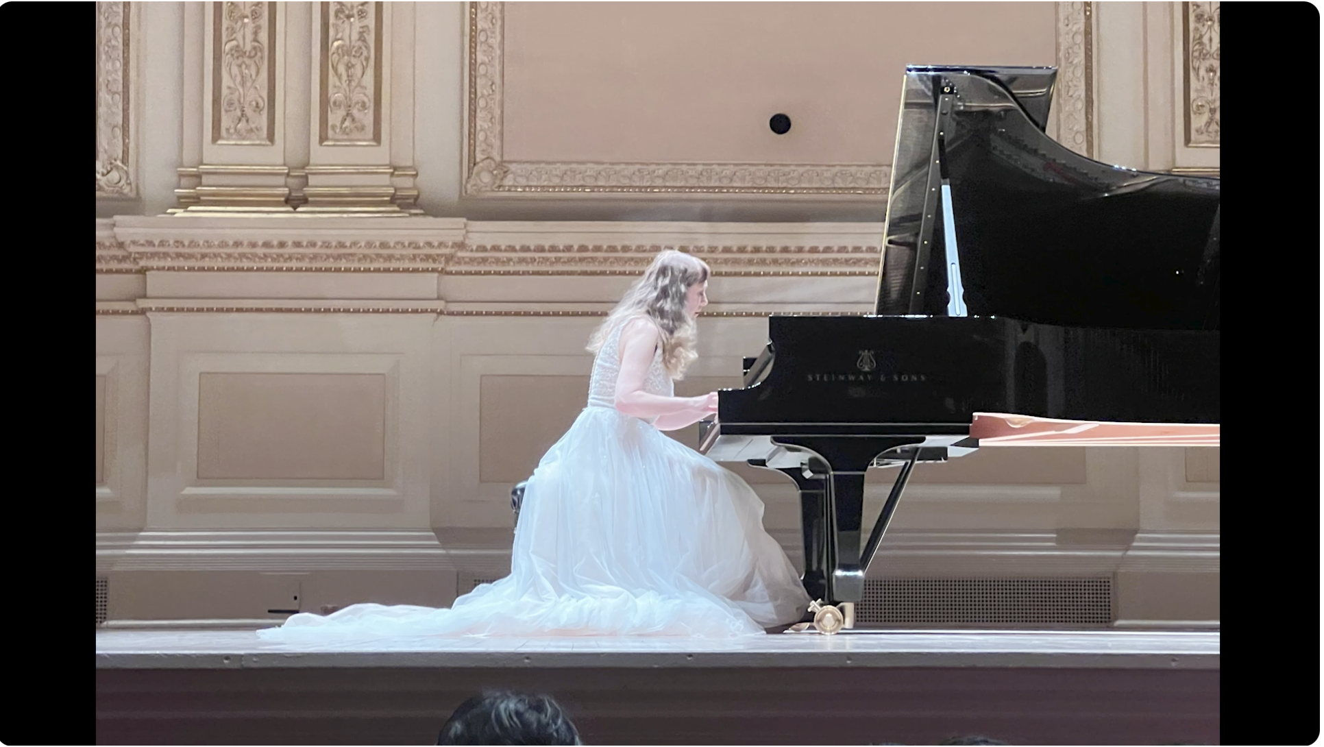 Pianist Katya Grineva performing at Carnegie Hall