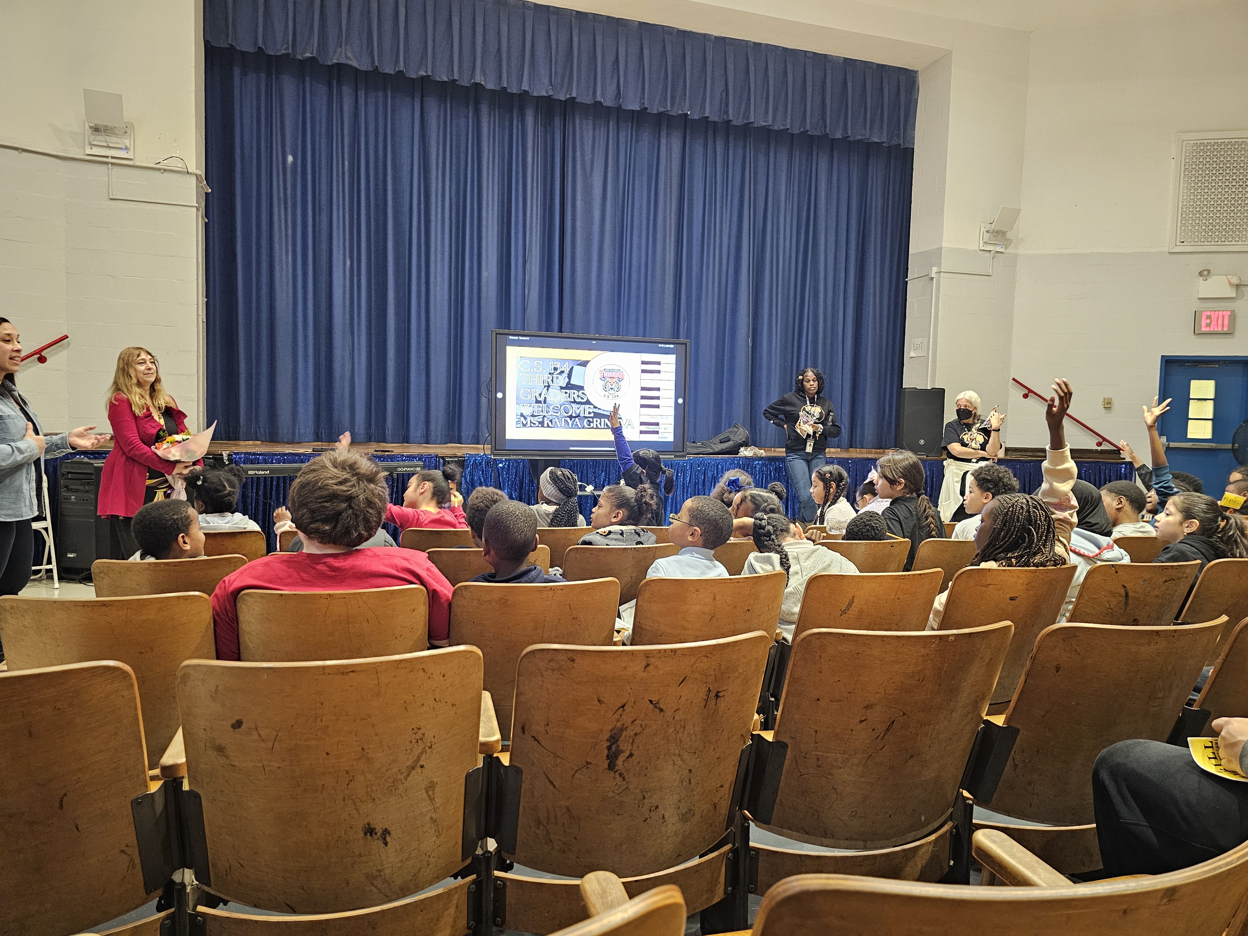 Pianist Katya Grineva with Bronx students at a music education event