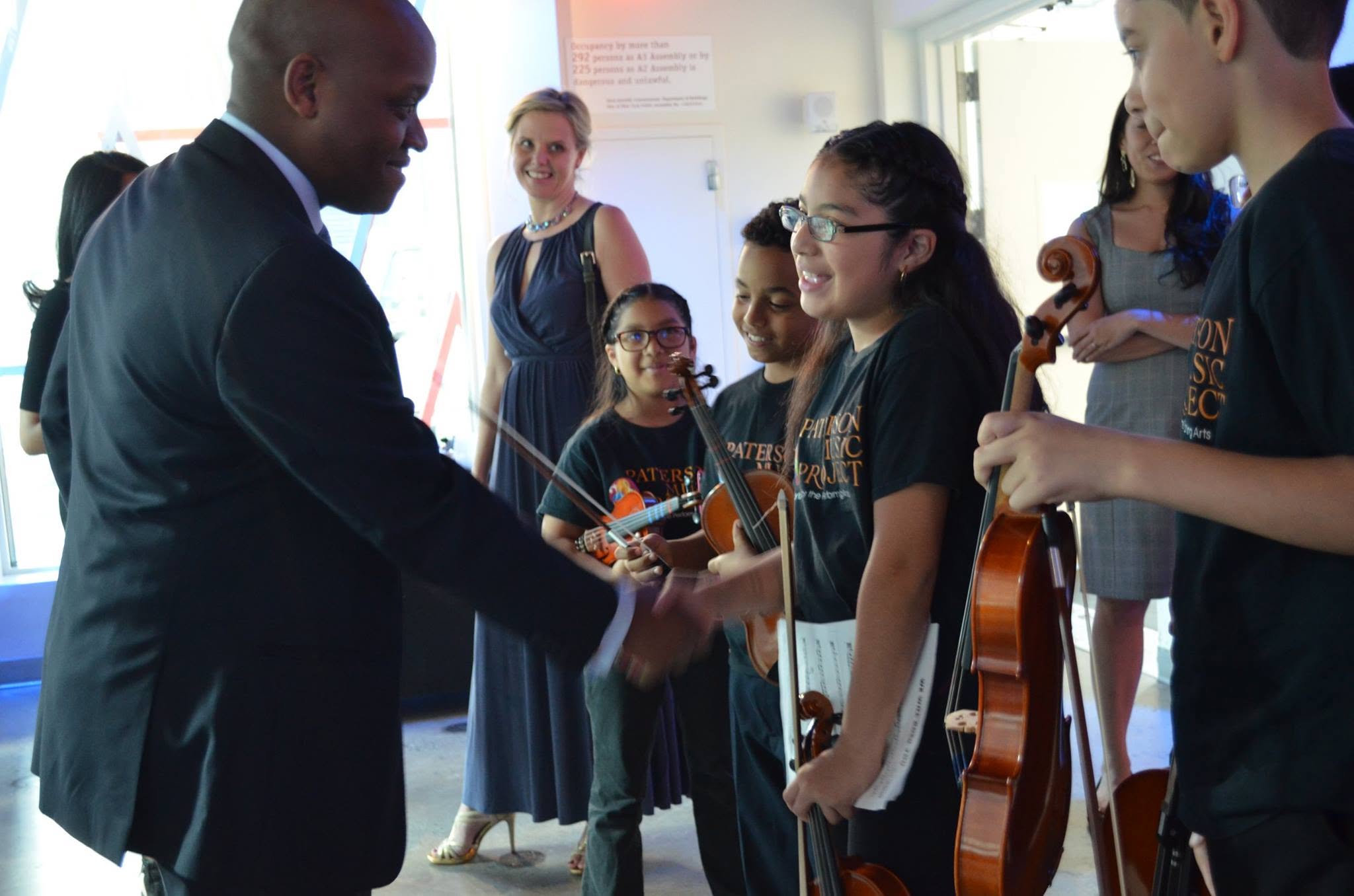 Artists and students connect at a meet and greet event